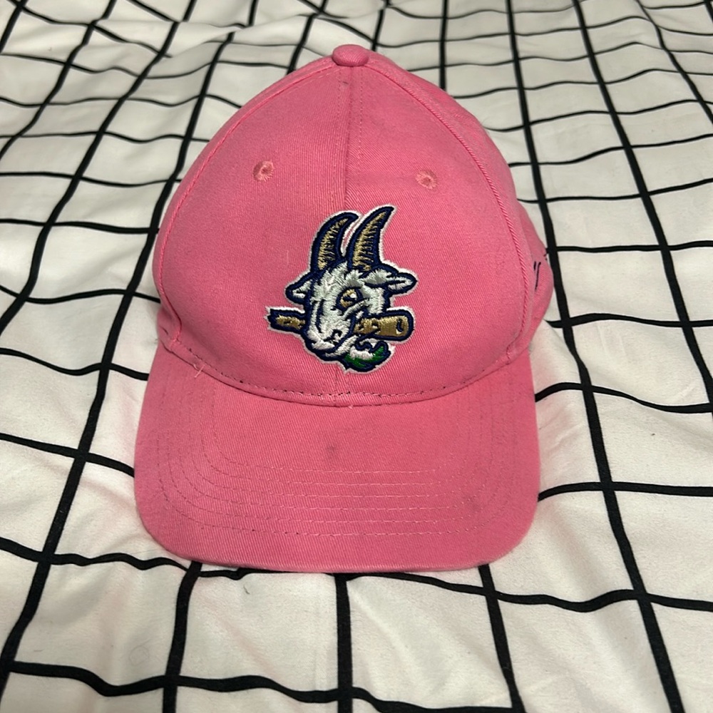 Little stains, in good condition, a Velcro adjuster